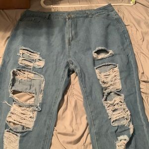 Distressed denim jeans